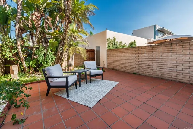 a view of balcony with furniture