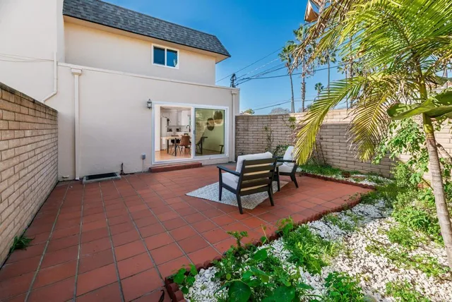 a front view of a building with retail shops