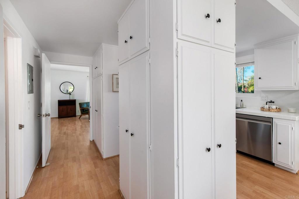 201 4th Street, Unit A/B Encinitas, CA 92024 - Photo 8 of 33 a view of a hallway with wooden floor and closet