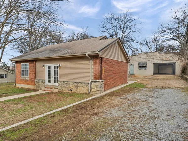 a house with yard in front of it