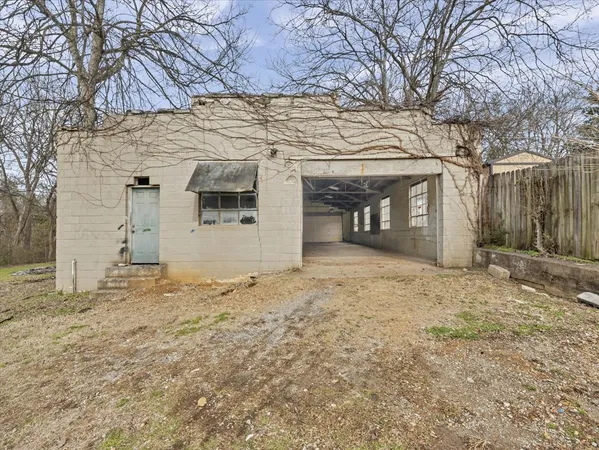 a view of a house with a snow in the yard
