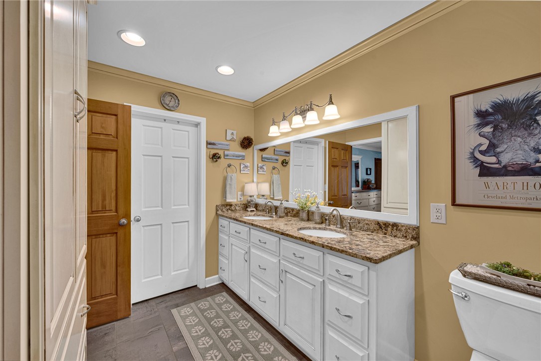 1010 Ridgeview Drive Pendleton, SC 29670 - Photo 26 of 47 This spacious bathroom offers a double vanity with ample storage and elegant granite counters.