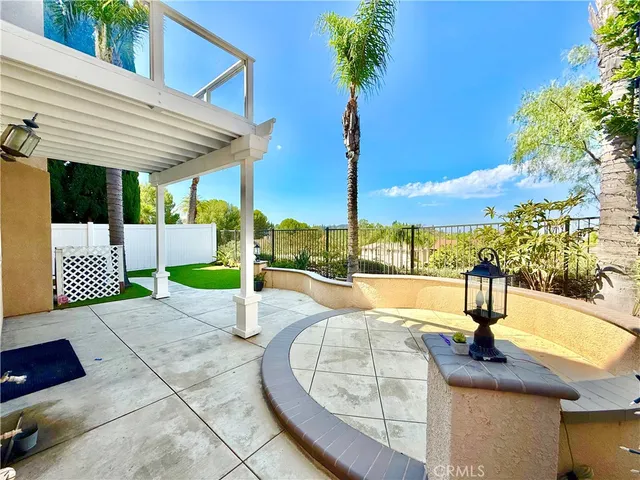 a view of a swimming pool with a patio