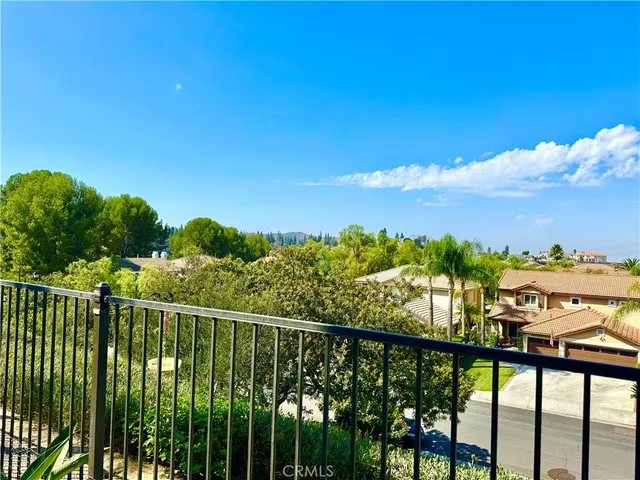 a view of a balcony with an outdoor space