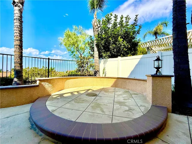a view of a swimming pool with a potted plant