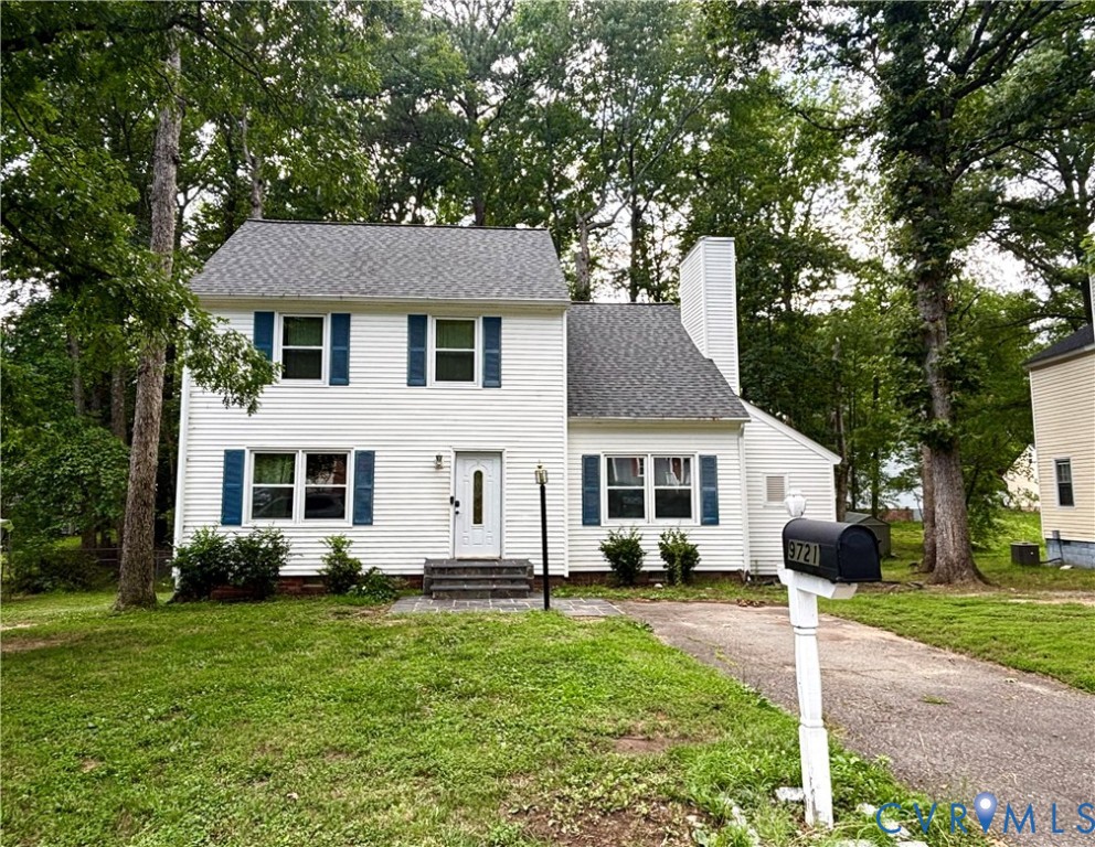 9721 Kennesaw Road Richmond, VA 23236 - Photo 1 of 1 White siding residence with a gray shingle roof, b