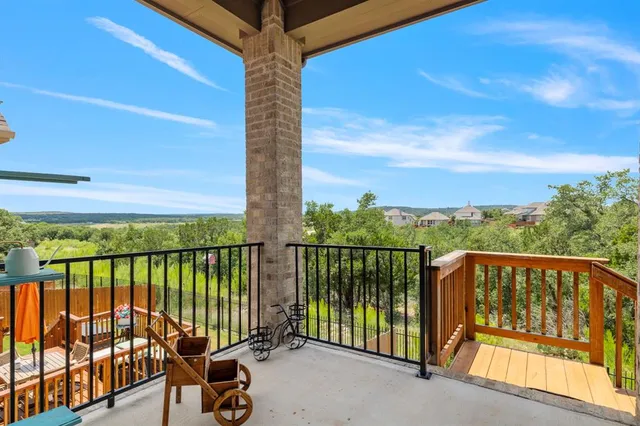 a view of a street from a balcony