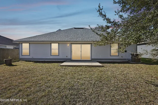 an aerial view of residential building with parking space