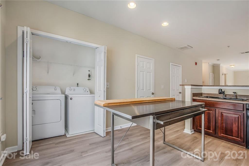 642 Raphael Place Charlotte, NC 28205 - Photo 11 of 27 a room with a table and chairs
