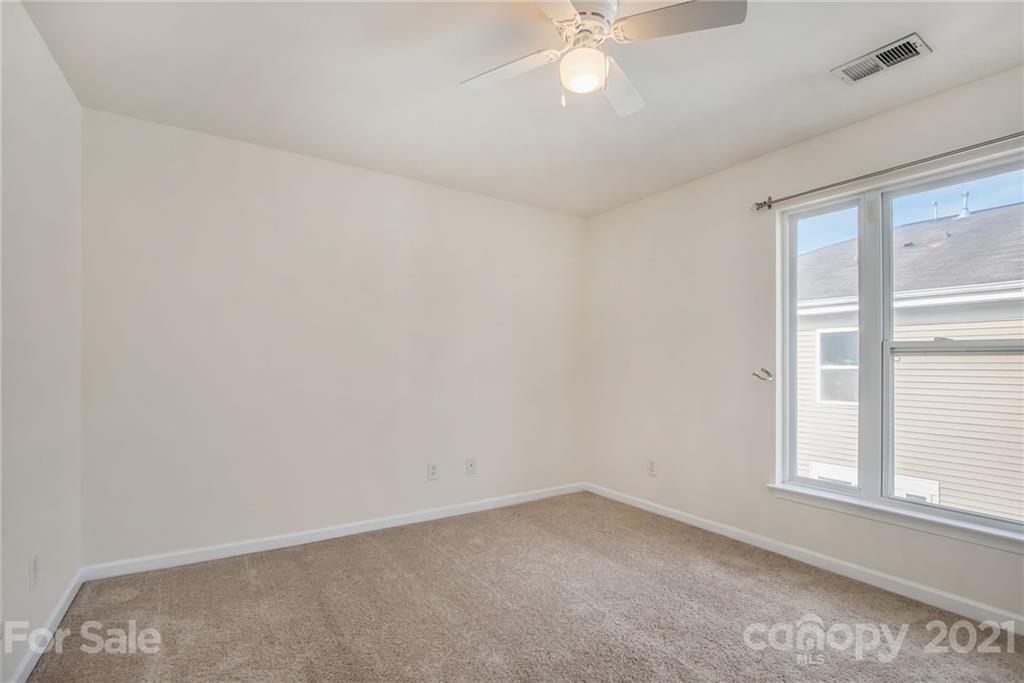 642 Raphael Place Charlotte, NC 28205 - Photo 13 of 27 an empty room with a window