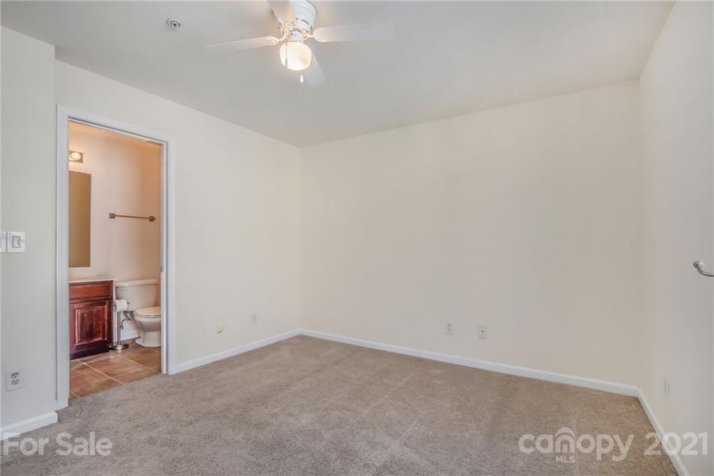 642 Raphael Place Charlotte, NC 28205 - Photo 14 of 27 an empty room with a bathroom