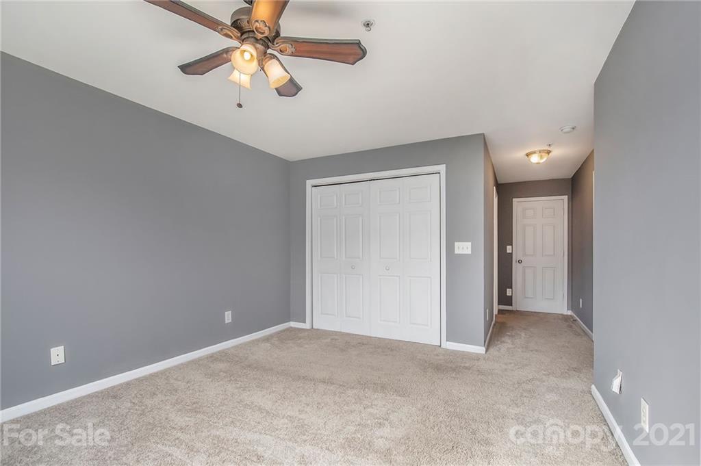 642 Raphael Place Charlotte, NC 28205 - Photo 18 of 27 a view of a chandelier fan in a room