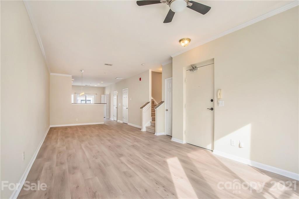 642 Raphael Place Charlotte, NC 28205 - Photo 5 of 27 a view of empty room with a ceiling fan