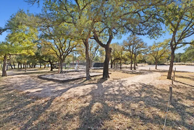 a view of road and trees