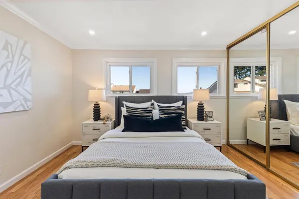 a bed room with a bed and furniture