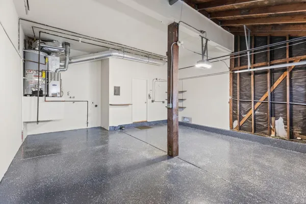 a view of an empty room with cabinet