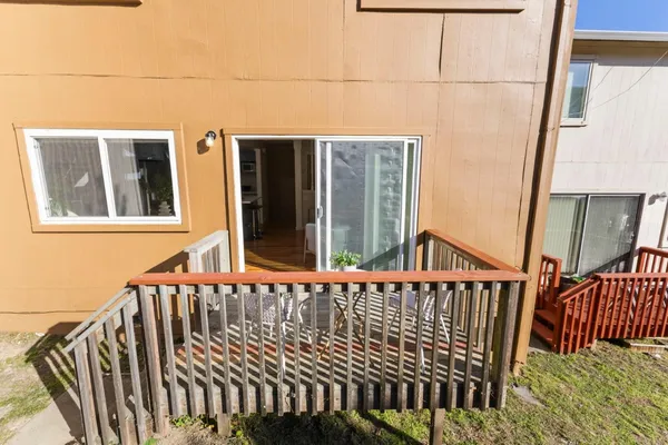 a view of a balcony with a window