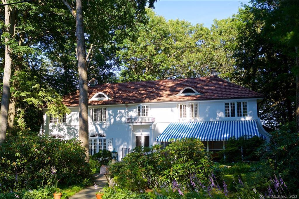 a view of a house with a garden
