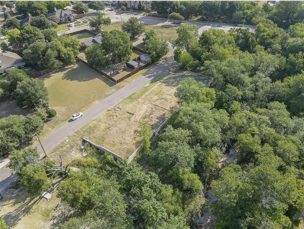 6722 Starbuck Drive Dallas, TX 75252 - Photo 27 of 29 an aerial view of residential house with outdoor space