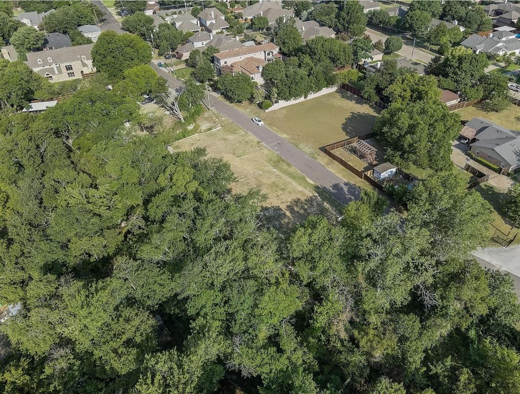 6722 Starbuck Drive Dallas, TX 75252 - Photo 29 of 29 an aerial view of residential house with outdoor space and trees all around