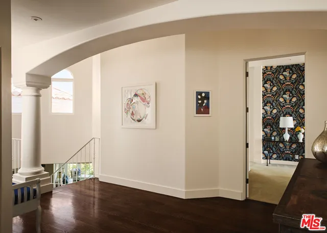 a view of entryway with wooden floor