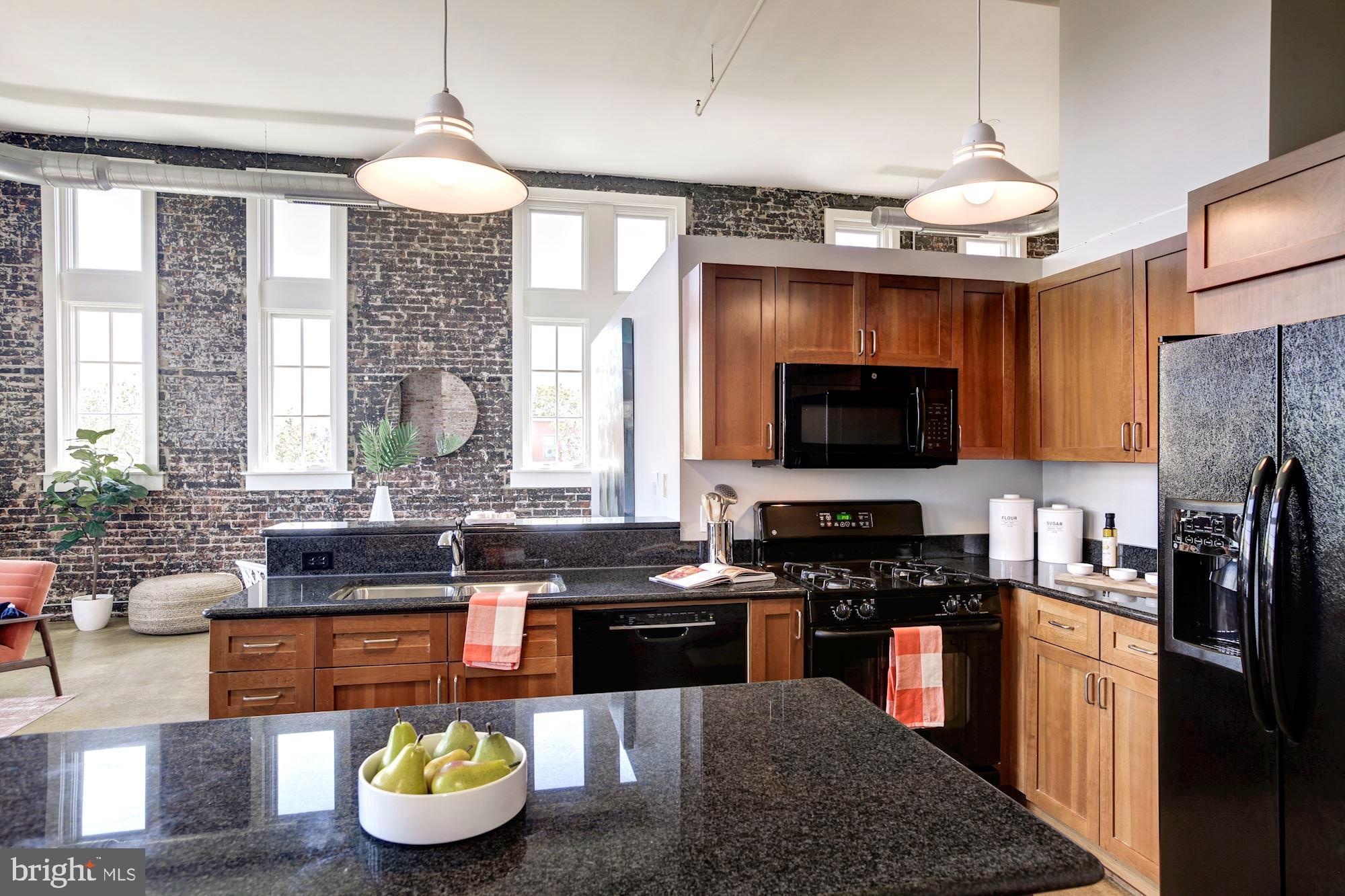 440 12th Street Northeast, Unit 201 Washington, DC 20002 - Photo 10 of 20 Granite counter tops and pendent lighting