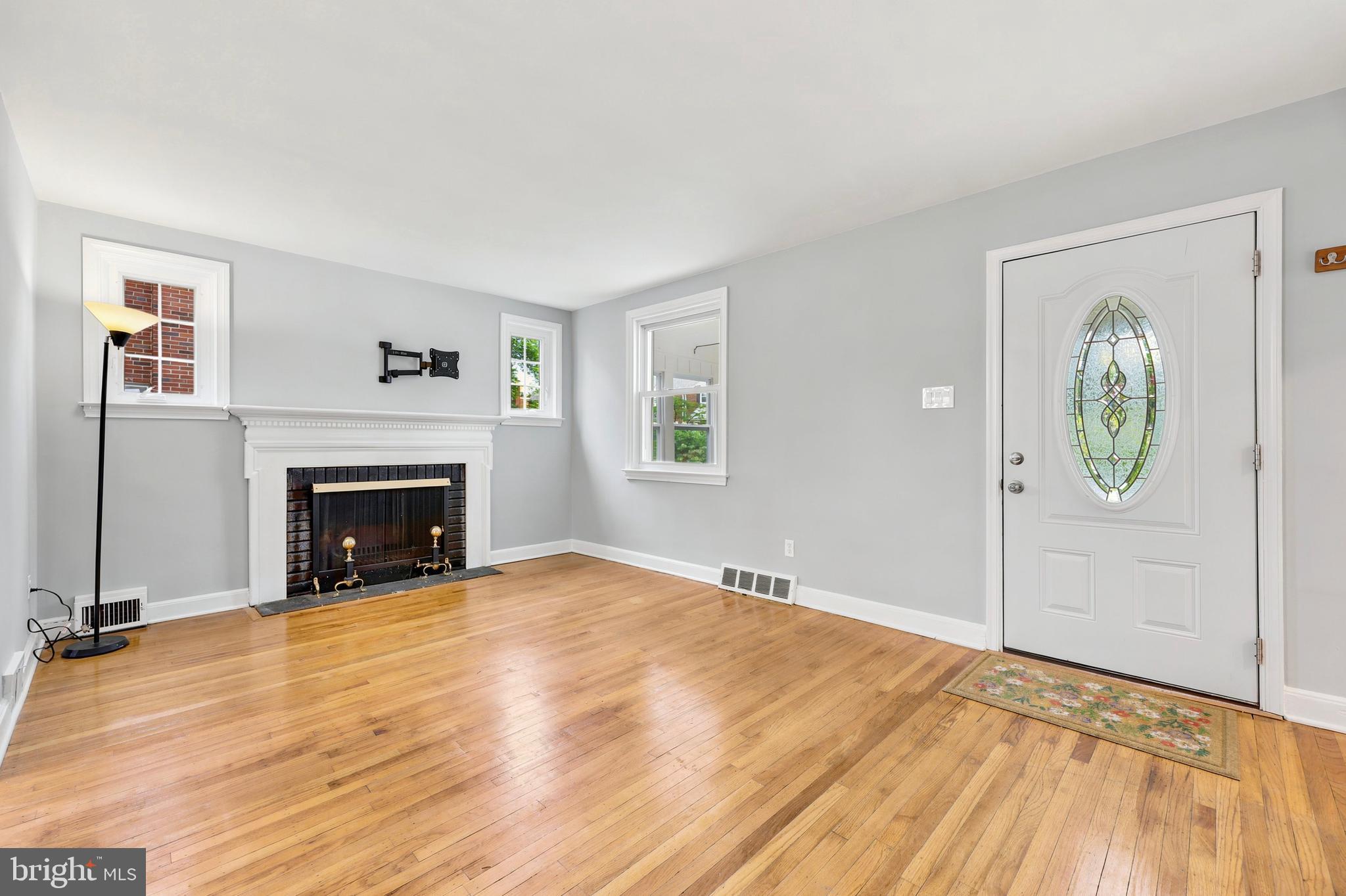 102 Rockglen Road Wynnewood, PA 19096 - Photo 12 of 24 Living Room with Fireplace