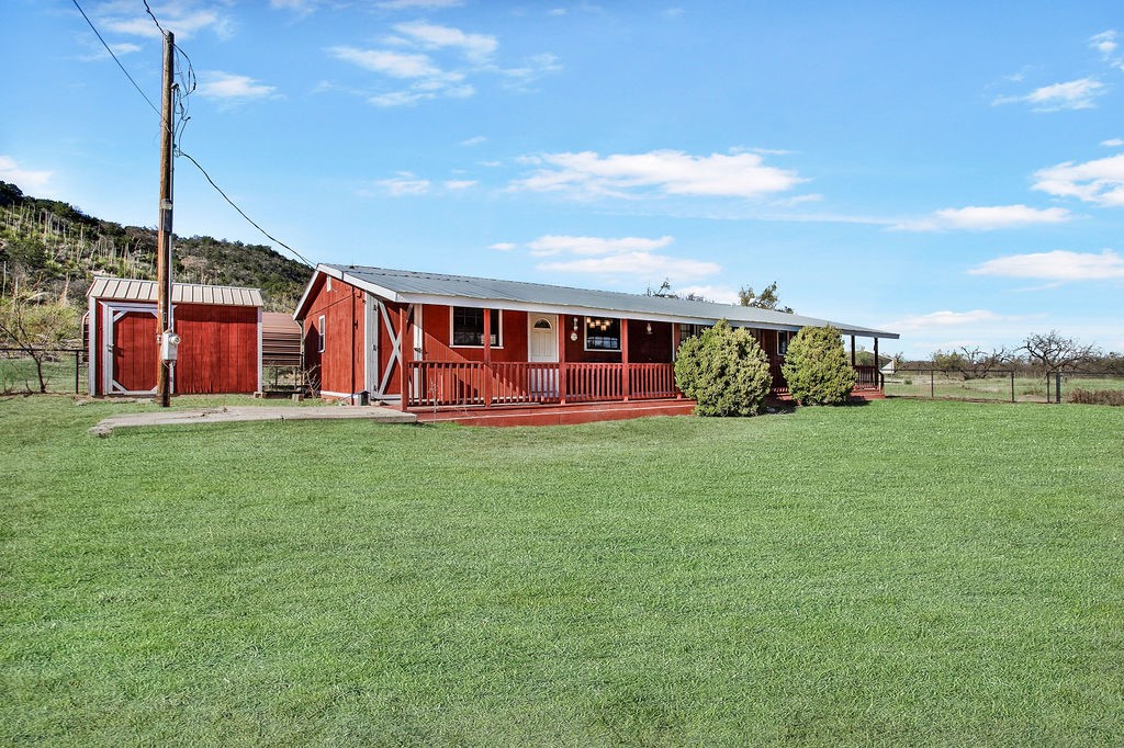 9475 Highway 377 Junction, TX 76849 - Photo 28 of 40 a view of a house with backyard