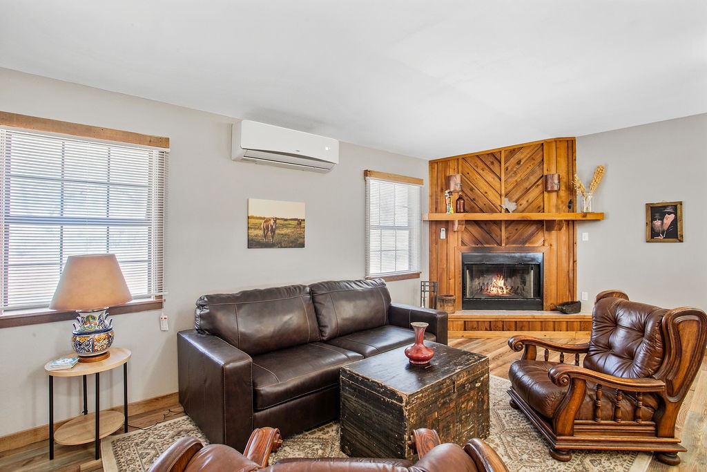 9475 Highway 377 Junction, TX 76849 - Photo 5 of 40 a living room with furniture and a fireplace