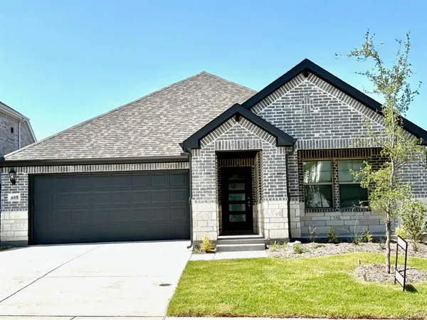 a front view of a building with glass windows