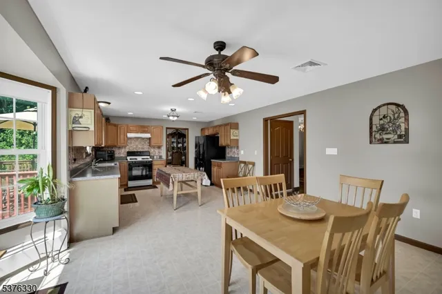 a view of a dining room with furniture