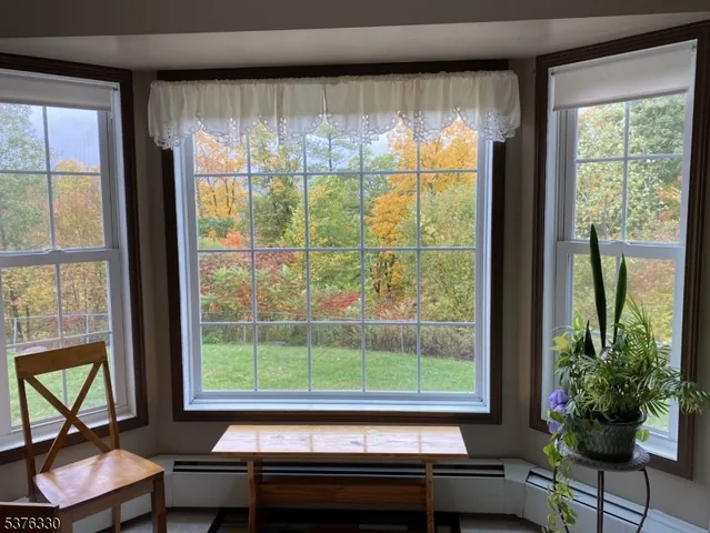 a room with furniture and a window