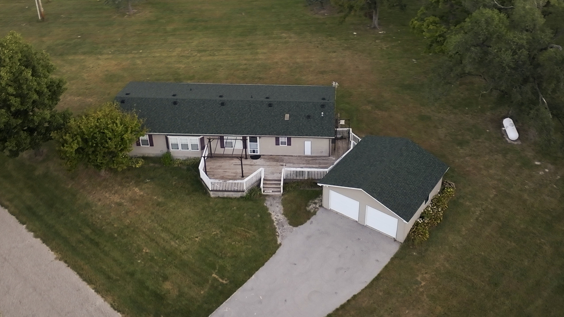 823 Columbia Road Washburn, IL 61570 - Photo 14 of 46 an aerial view of a house with pool fire pit and outdoor seating