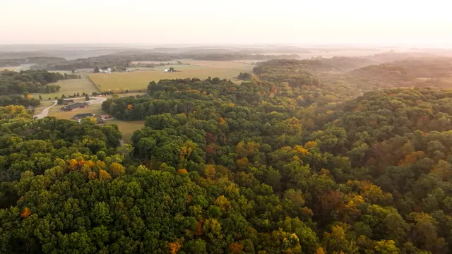 an aerial view of residential building with parking space