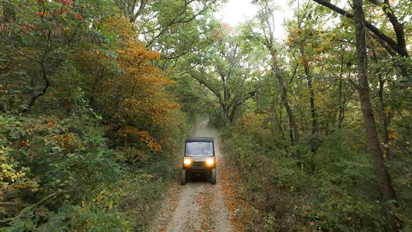 an aerial view of a house with a lake view