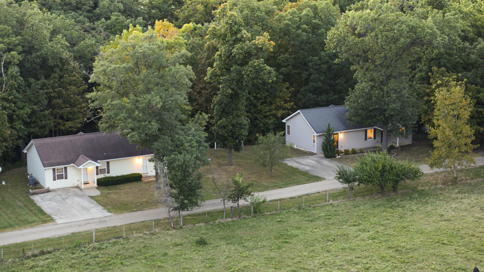823 Columbia Road Washburn, IL 61570 - Photo 25 of 46 an aerial view of a house with a yard