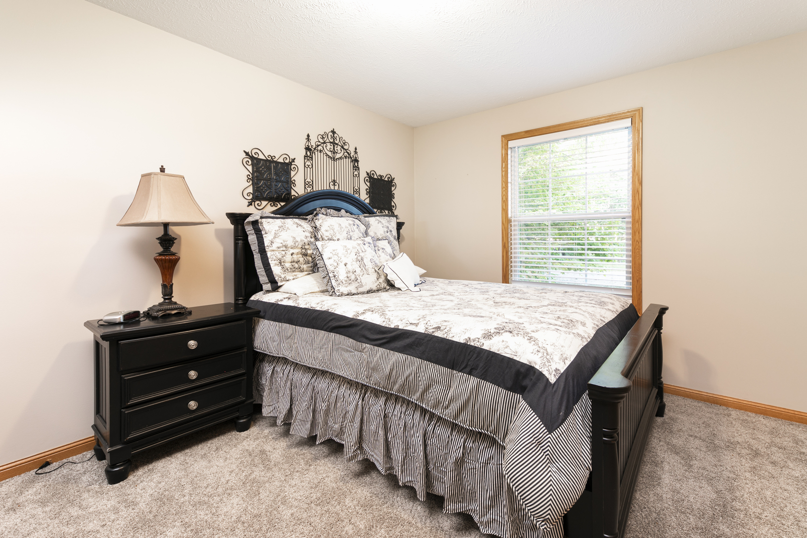 823 Columbia Road Washburn, IL 61570 - Photo 35 of 46 a bedroom with a bed and a window
