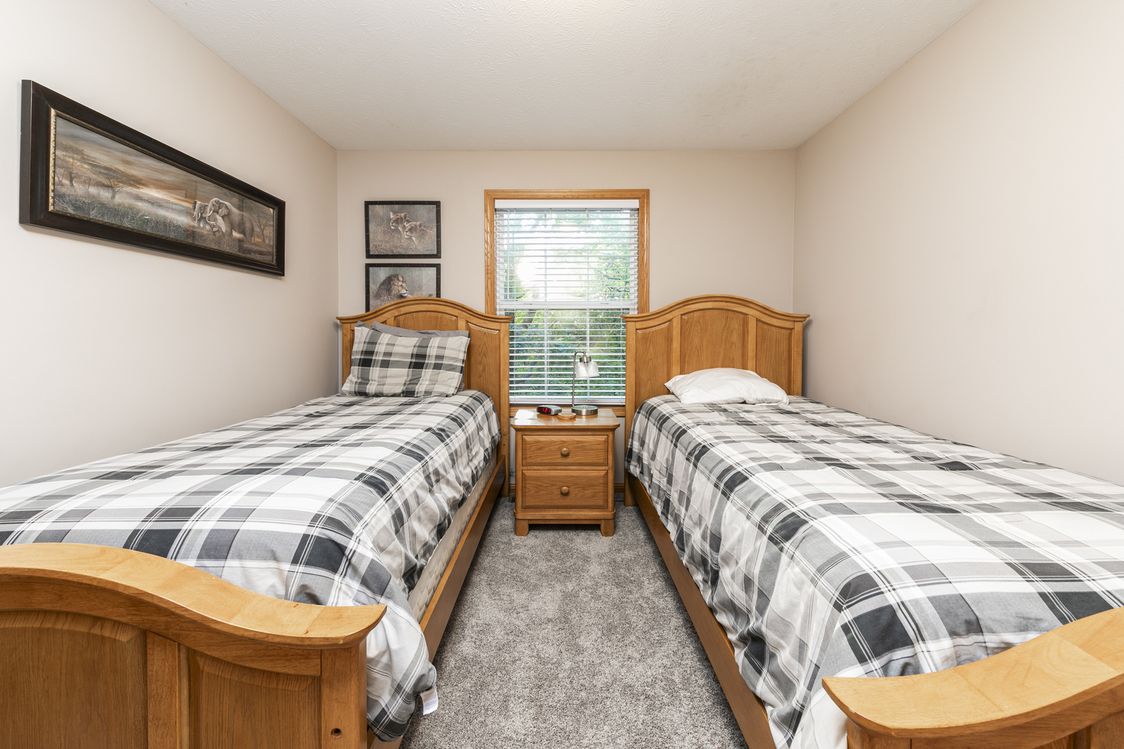 823 Columbia Road Washburn, IL 61570 - Photo 36 of 46 a bedroom with two beds and painting on the wall