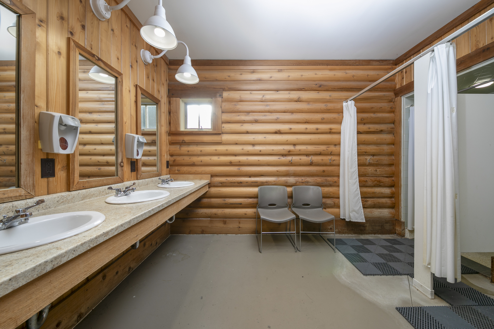 823 Columbia Road Washburn, IL 61570 - Photo 42 of 46 a bathroom with a sink a toilet and shower