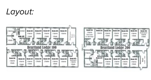 a view of a building with a couple of cars