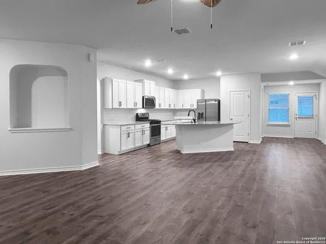 a view of kitchen with wooden floor