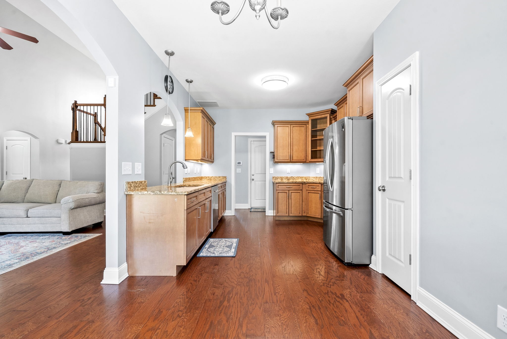 4244 Sango Road Clarksville, TN 37043 - Photo 15 of 43 a kitchen with a refrigerator and a stove top oven