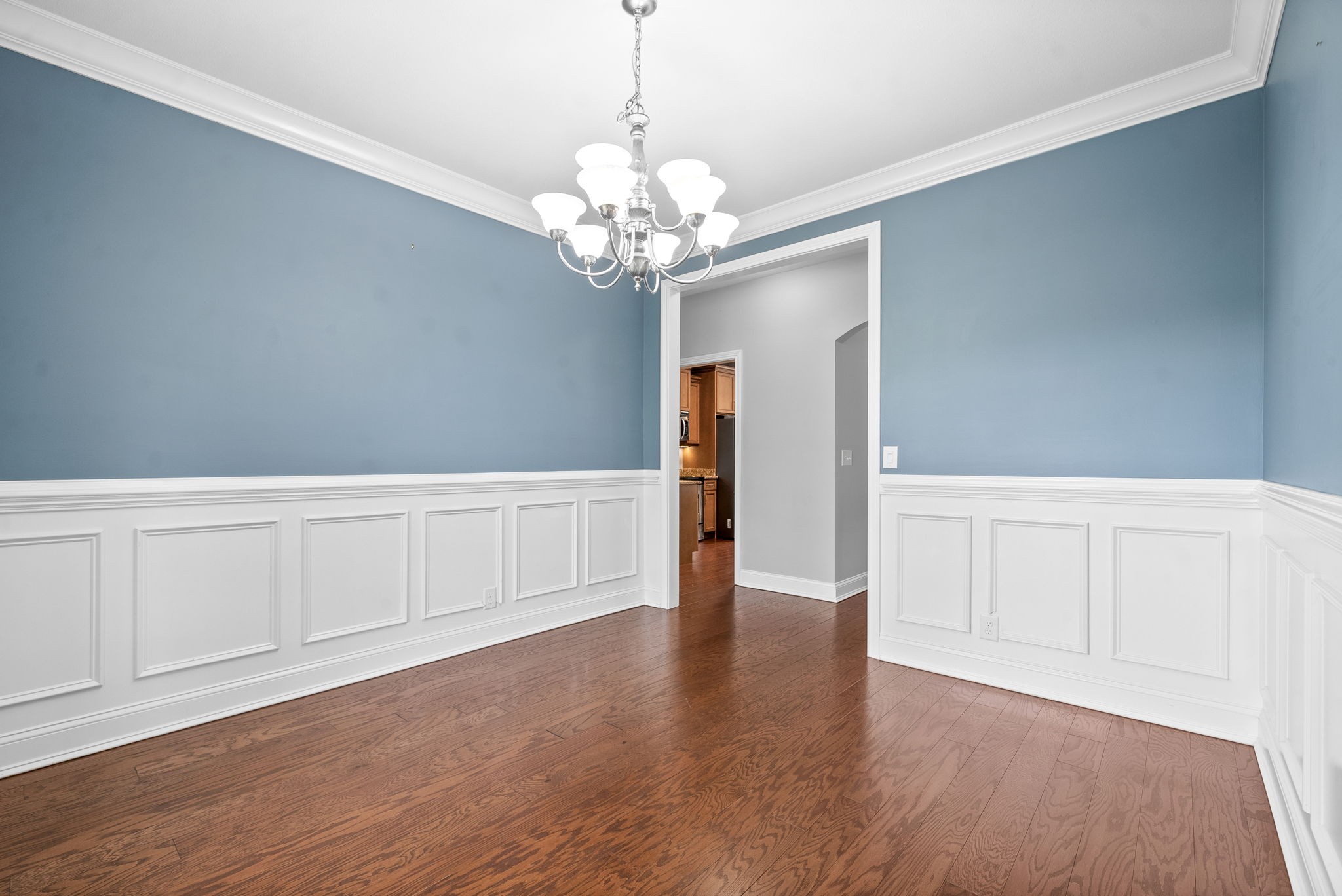 4244 Sango Road Clarksville, TN 37043 - Photo 17 of 43 a view of an empty room with chandelier