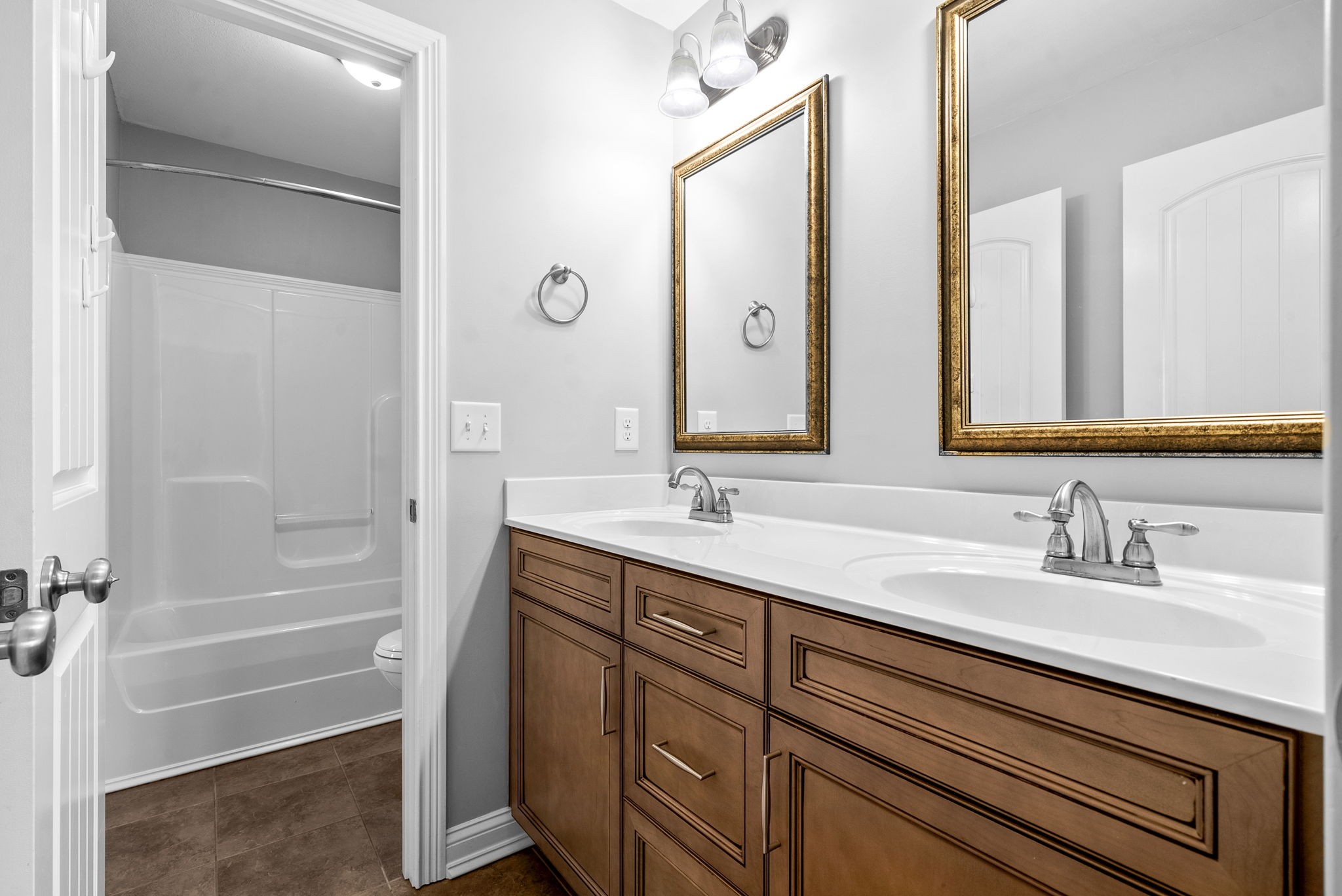 4244 Sango Road Clarksville, TN 37043 - Photo 29 of 43 a bathroom with a sink double vanity and a mirror