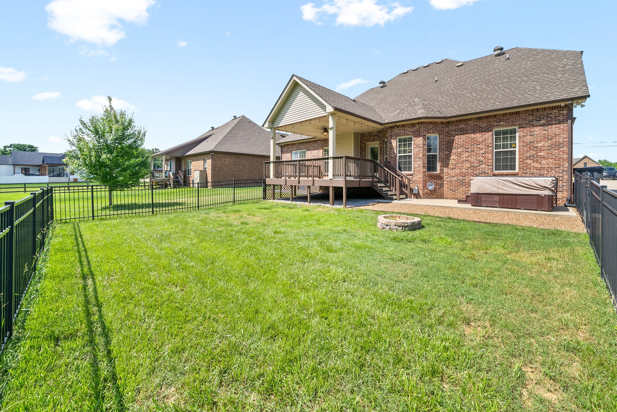 4244 Sango Road Clarksville, TN 37043 - Photo 37 of 43 a view of a house with a yard and sitting area