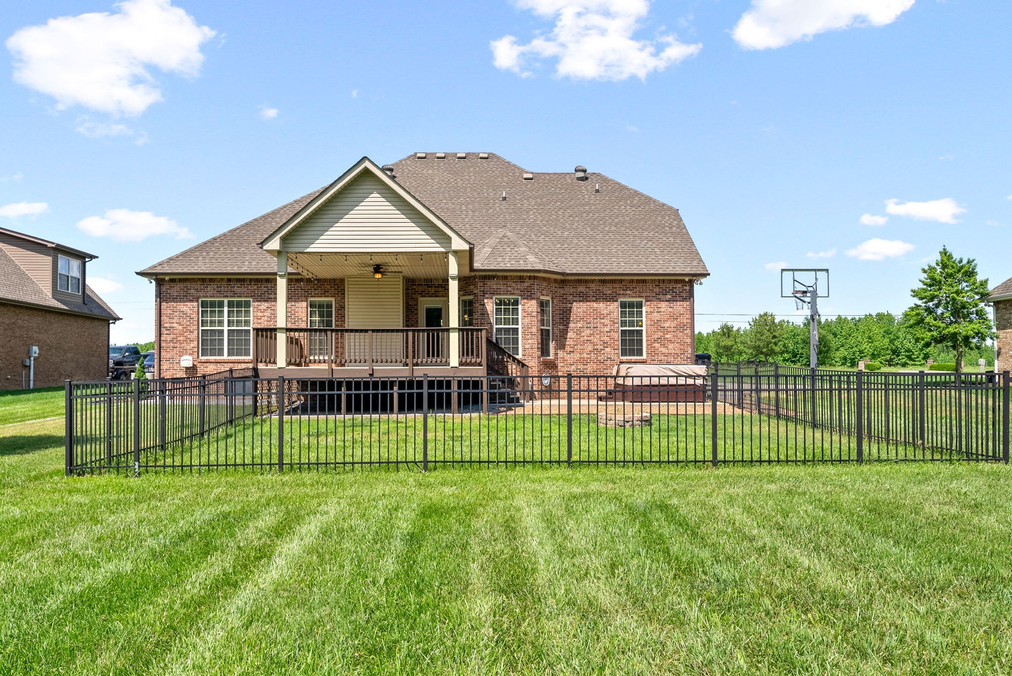 4244 Sango Road Clarksville, TN 37043 - Photo 41 of 43 a view of a house with a big yard and large trees
