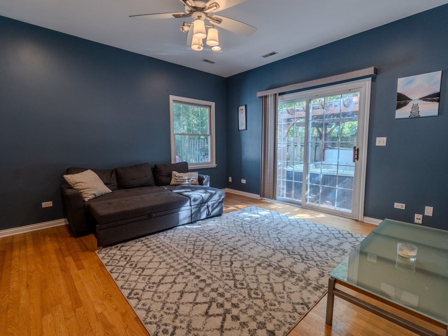 215 North River Road Fox River Grove, IL 60021 - Photo 13 of 25 a living room with furniture and a large window