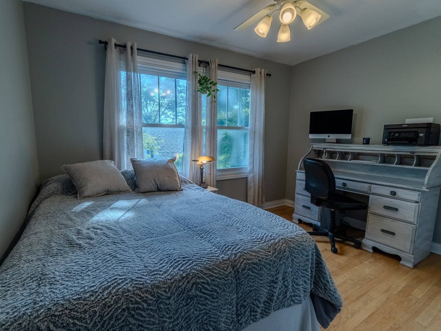 215 North River Road Fox River Grove, IL 60021 - Photo 16 of 25 a bedroom with a bed and flat screen tv