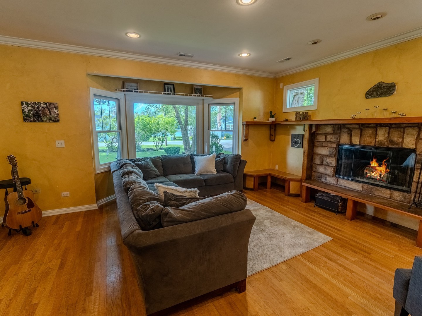 215 North River Road Fox River Grove, IL 60021 - Photo 10 of 25 a living room with furniture and a fireplace