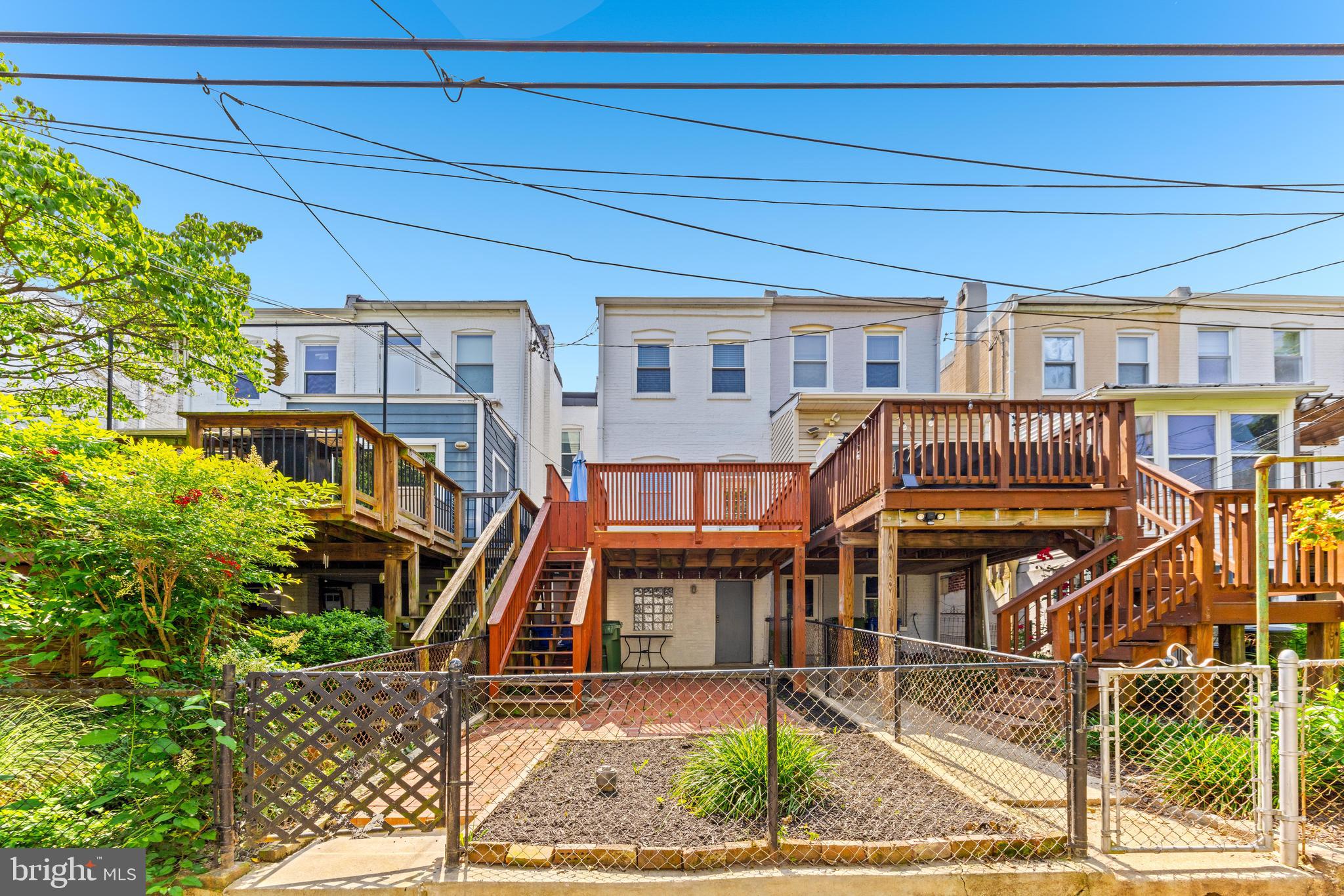 3353 Beech Avenue Baltimore, MD 21211 - Photo 32 of 32 a front view of a house with a yard